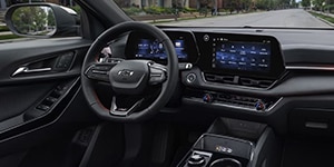 Interior do Chevrolet Equinox RS, painel digital moderno com volante esportivo